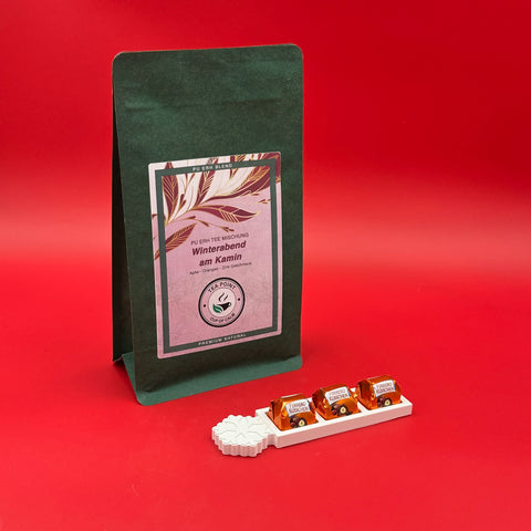 Winterabend am Kamin (100g) und Ferrero Küsschen auf handgegossenem Schneeflocken-Halter